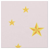 Goldene gelbe Sterne auf hellrosa Stoff (Nahaufnahme)