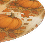 Goldene Herbstpumpen und fallende Blätter Schneidebrett (Ecke)