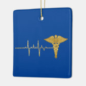 Goldene Herzfrequenz und Caduceus Ornament (Links)