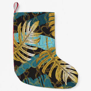 Goldene Kettenvorhang, tropische Blätter. Kleiner Weihnachtsstrumpf