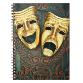 Goldene Komödie und Tragödien auf gemusterten Notizblock (Vorderseite)