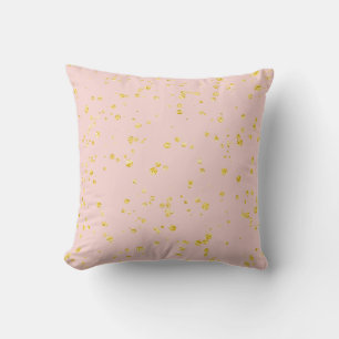 Goldene Konfetti-Punkte in Rosa Kissen
