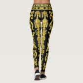 Goldene Medusa mit Arabesques über schwarze Leggin Leggings (Rückseite)