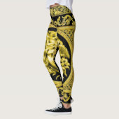 Goldene Medusa mit Arabesques über schwarze Leggin Leggings (Links)