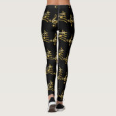 Goldene Musiknoten auf schwarzen Leggings (Rückseite)