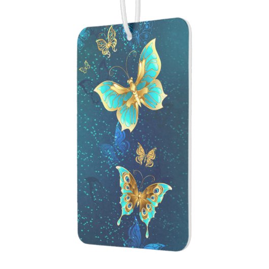 Goldene Schmetterlinge auf blauem Hintergrund Autolufterfrischer (Links)