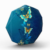 Goldene Schmetterlinge auf blauem Hintergrund Fotoblock (Links)