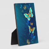 Goldene Schmetterlinge auf blauem Hintergrund Fotoplatte (Seite)