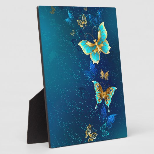 Goldene Schmetterlinge auf blauem Hintergrund Fotoplatte (Seite)