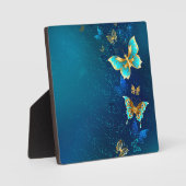 Goldene Schmetterlinge auf blauem Hintergrund Fotoplatte (Vorderseite)