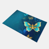 Goldene Schmetterlinge auf blauem Hintergrund Fußmatte (Schrägansicht)