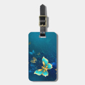 Goldene Schmetterlinge auf blauem Hintergrund Gepäckanhänger (Vorderseite vertikal)