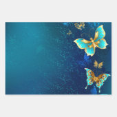 Goldene Schmetterlinge auf blauem Hintergrund Geschenkpapier Set (Vorderseite)