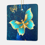 Goldene Schmetterlinge auf blauem Hintergrund Keramikornament (Links)
