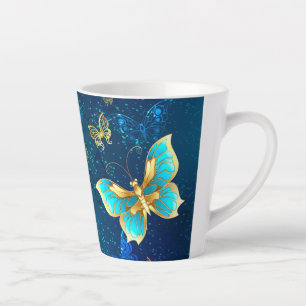Goldene Schmetterlinge auf blauem Hintergrund Milchtasse