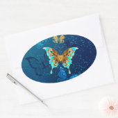 Goldene Schmetterlinge auf blauem Hintergrund Ovaler Aufkleber (Umschlag)