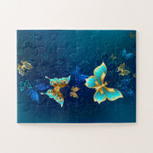 Goldene Schmetterlinge auf blauem Hintergrund Puzzle (Horizontal)