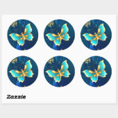 Goldene Schmetterlinge auf blauem Hintergrund Runder Aufkleber (Blatt)
