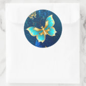 Goldene Schmetterlinge auf blauem Hintergrund Runder Aufkleber (Tasche)