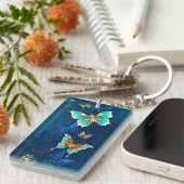 Goldene Schmetterlinge auf blauem Hintergrund Schlüsselanhänger (Vorderseite rechts)