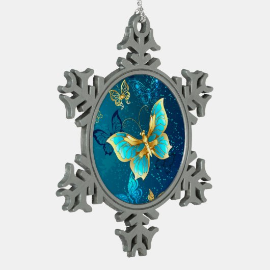 Goldene Schmetterlinge auf blauem Hintergrund Schneeflocken Zinn-Ornament (Links)