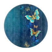 Goldene Schmetterlinge auf blauem Hintergrund Schneidebrett (Vorderseite)