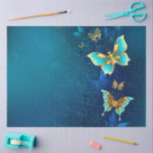 Goldene Schmetterlinge auf blauem Hintergrund Seidenpapier (Basteln)