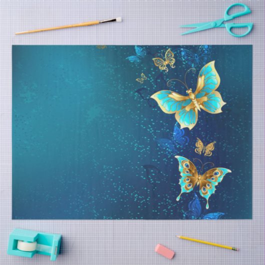Goldene Schmetterlinge auf blauem Hintergrund Seidenpapier (Basteln)
