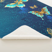 Goldene Schmetterlinge auf blauem Hintergrund Sherpadecke (3/4)