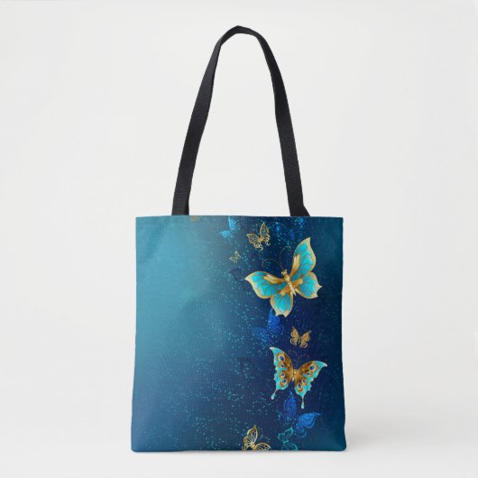 Goldene Schmetterlinge auf einem blauen Hintergrun Tasche (Vorderseite)