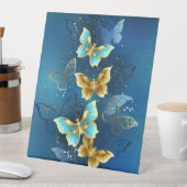 Goldene Schmetterlinge Sockelschild (In Situ)