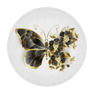 Goldene Schmetterlingsblume mit schwarzer Orchidee Schneidebrett