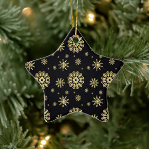 Goldene Schneeflocke auf schwarzem Hintergrund Keramik Ornament