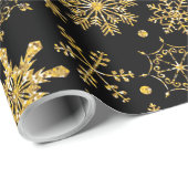 Goldene Schneeflocke auf schwarzem Hintergrund Wei Geschenkpapier (Rolleneckpunkt)