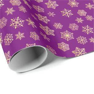 Goldene Schneeflocken auf einem lila Hintergrund Geschenkpapier