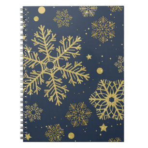 Goldene Schneeflocken auf Navy Notizblock