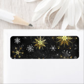 Goldene Schneeflocken auf schwarzem Hintergrund (Insitu)