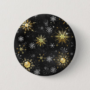 Goldene Schneeflocken auf schwarzem Hintergrund Button