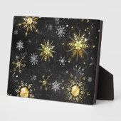 Goldene Schneeflocken auf schwarzem Hintergrund Fotoplatte (Seite)