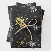 Goldene Schneeflocken auf schwarzem Hintergrund Geschenkpapier Set (Beispiel)