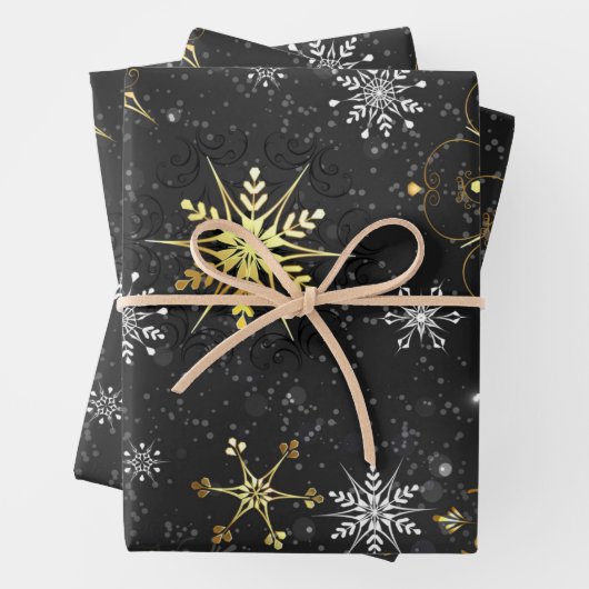 Goldene Schneeflocken auf schwarzem Hintergrund Geschenkpapier Set (Beispiel)