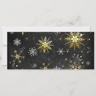 Goldene Schneeflocken auf schwarzem Hintergrund Karte