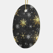 Goldene Schneeflocken auf schwarzem Hintergrund Keramik Ornament (Links)