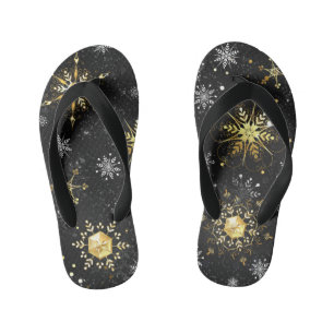Goldene Schneeflocken auf schwarzem Hintergrund Kinderbadesandalen