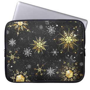 Goldene Schneeflocken auf schwarzem Hintergrund Laptopschutzhülle