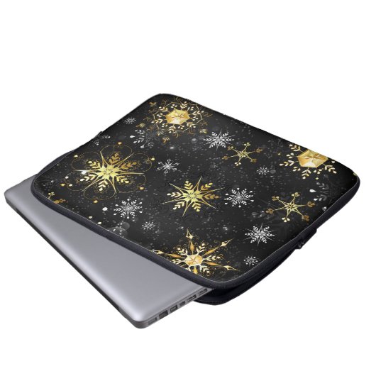 Goldene Schneeflocken auf schwarzem Hintergrund Laptopschutzhülle (Vorne Knopf)