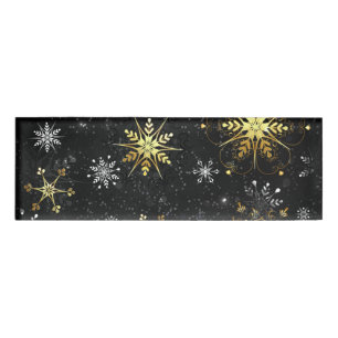 Goldene Schneeflocken auf schwarzem Hintergrund Namenschild