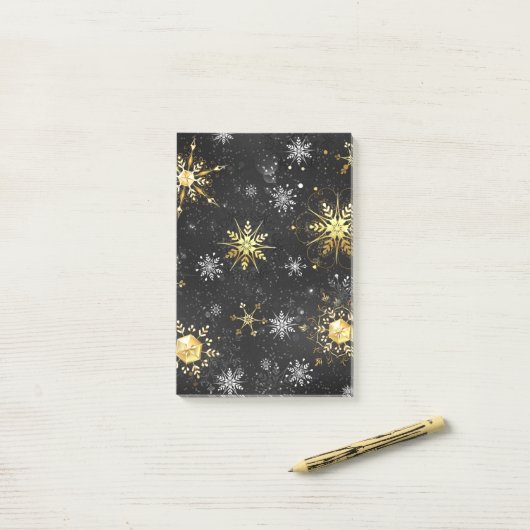 Goldene Schneeflocken auf schwarzem Hintergrund Post-it Klebezettel (Auf Schreibtisch)