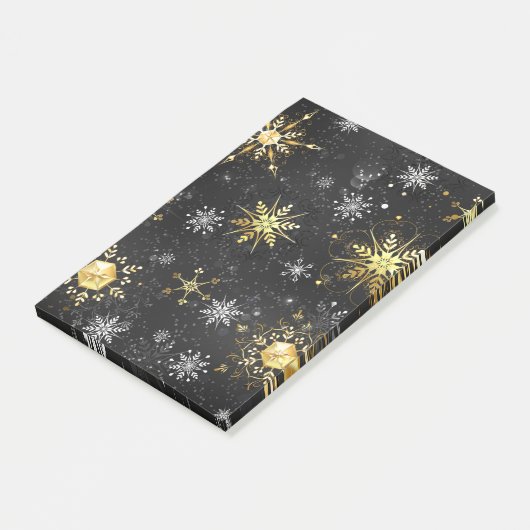 Goldene Schneeflocken auf schwarzem Hintergrund Post-it Klebezettel (angewinkelt)