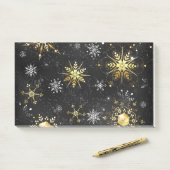 Goldene Schneeflocken auf schwarzem Hintergrund Post-it Klebezettel (Auf Schreibtisch)